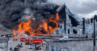 Large fire engulfing a stage set.