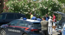 Carabinieri at a car accident scene.