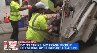 Screenshot of sanitation workers loading trash into a garbage truck during a strike.
