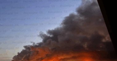 Large fire with thick black smoke.
