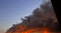 Large fire burning at night.