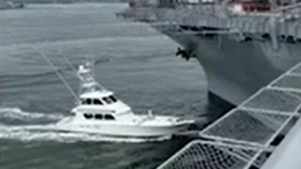 Unbelievable moment boozy boat captain slams into US warship