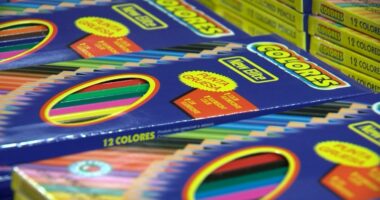 Volunteers build 15,000 backpacks for kids to help them in the school year