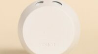 White Pura smart home fragrance diffuser.