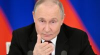 Vladimir Putin speaking at a press conference.