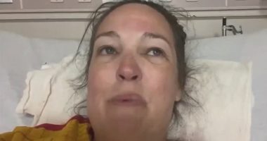 Shark attack victim in hospital bed.