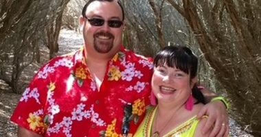 Dyan Henry with her husband and their child.