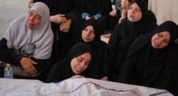 52 Palestinians in Gaza are killed by Israeli airstrikes or shot dead while seeking aid