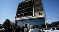 A fire at a shopping center in eastern Iraq kills more than 60 people