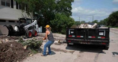 Armies of Texas volunteers dig out, clean up, after fatal floods