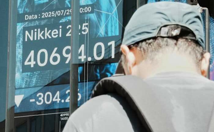 Asian shares mostly slip as focus shifts to US talks with China