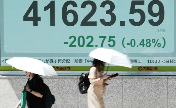 Asian shares retreat after Alphabet and AI stocks nudge Wall Street to more records