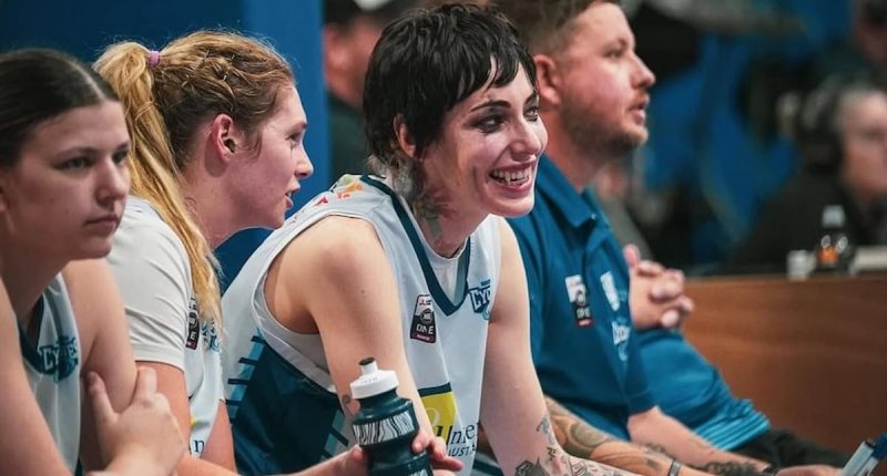 Aussie basketball star goes viral for wearing goth makeup during matches - and turning two of their teeth into FANGS