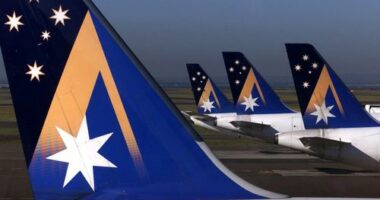 SPECIAL 9872 Ansett Takeoff; Sydney; Picture by Dallas Kilponen; Sun Herald; 29th September 2001. Pic shows Ansett planes ready for work at Sydney Airport. Tail
