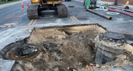 Bay Street near Jacksonville's Maxwell House Coffee plant down to 1 lane