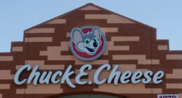 Chuck E. Cheese employee arrested in iconic mouse mask for using stolen credit card, police say