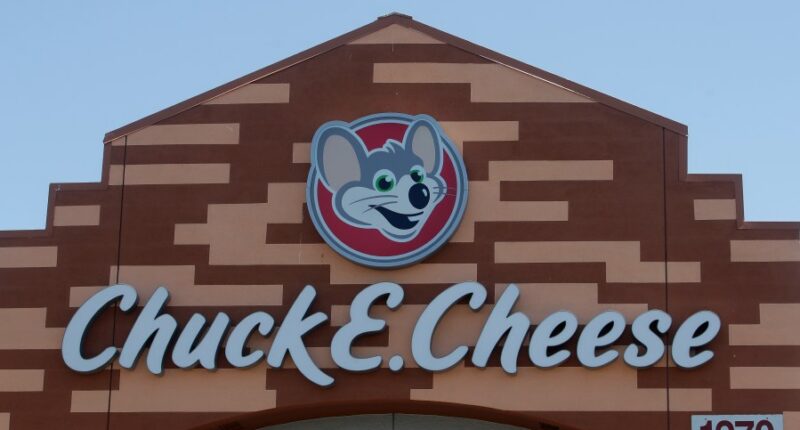 Chuck E. Cheese employee arrested in iconic mouse mask for using stolen credit card, police say