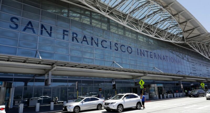 FILE - Vehicles wait outside the international terminal at San Francisco International Airport in San Francisco on July 11, 2017. Two airliners aborted landings at San Francisco International Airport on May 19, 2023, after pilots spotted a Southwest Airlines jet taxiing across runways on which the other planes had been cleared to land. The Federal Aviation Administration said Thursday, May 25, that it reviewed the matter and determined that appropriate steps were taken to ensure safety. (AP Photo/Marcio Jose Sanchez, File)