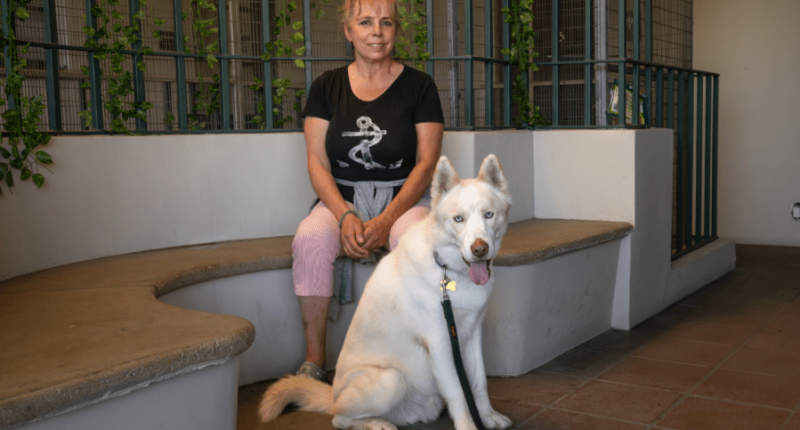Riley with his adopter on the day he went home.