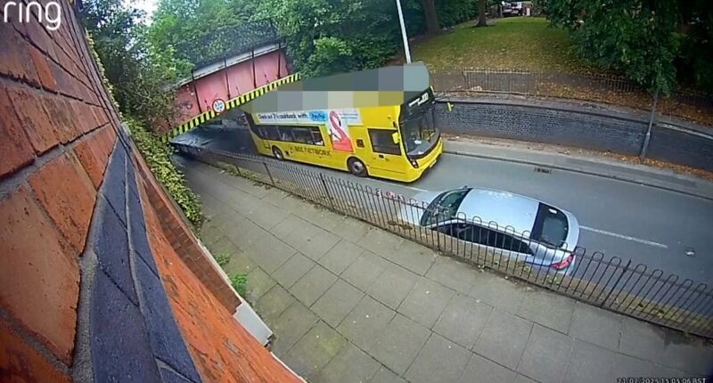 Double-decker bus driver is arrested after bridge crash injured 20 people