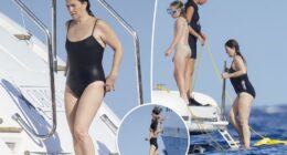 Drew Barrymore takes a dip in black swimsuit on yacht in St. Tropez