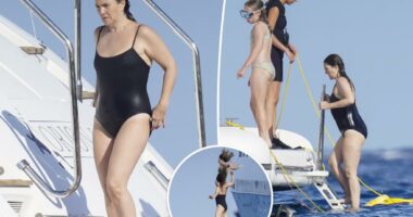 Drew Barrymore takes a dip in black swimsuit on yacht in St. Tropez