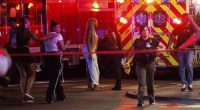 Drive-by shooting leaves four dead and 14 wounded, police say