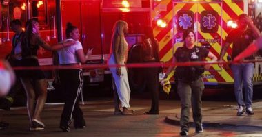 Drive-by shooting leaves four dead and 14 wounded, police say