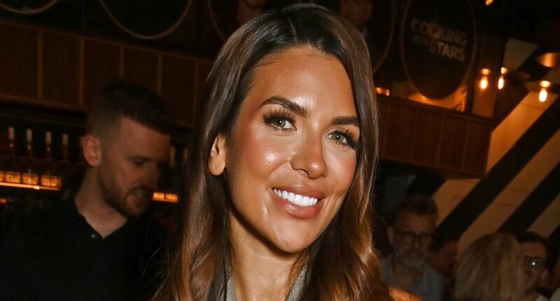 Ekin-Su Cülcüloğlu cuts a stylish figure in a grey tailored jumpsuit