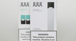 Packaging for an electronic cigarette and menthol pods from Juul Labs is displayed on Feb. 25, 2020, in Pembroke Pines, Fla. (AP Photo/Brynn Anderson, File)