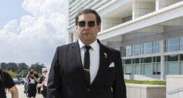 George Santos begins 7-year fraud sentence at federal prison in New Jersey