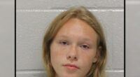 A mugshot of a teen girl.