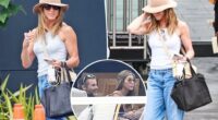 Glowing Jennifer Aniston touches down after cozy Mallorca vacation with rumored beau Jim Curtis