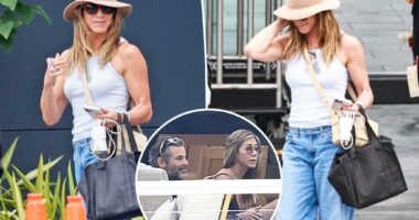 Glowing Jennifer Aniston touches down after cozy Mallorca vacation with rumored beau Jim Curtis
