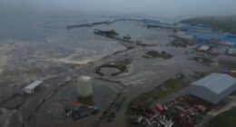 Hawaii and parts of Japan downgrade tsunami warnings to advisories