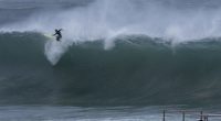 Homes under threat from seven-metre surf