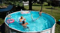 People enjoy the summer day in the pool on Wednesday, June 24, 2020, in Omaha, Neb. (Anna Reed/Omaha World-Herald via AP, File)