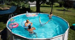People enjoy the summer day in the pool on Wednesday, June 24, 2020, in Omaha, Neb. (Anna Reed/Omaha World-Herald via AP, File)