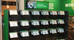 Woolworths is expanding the roll-out of its digital supermarket trolley, allowing thousands of customers to track their spending in real-time.