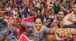 Indian workers go on a daylong nationwide strike against Modi's economic reforms