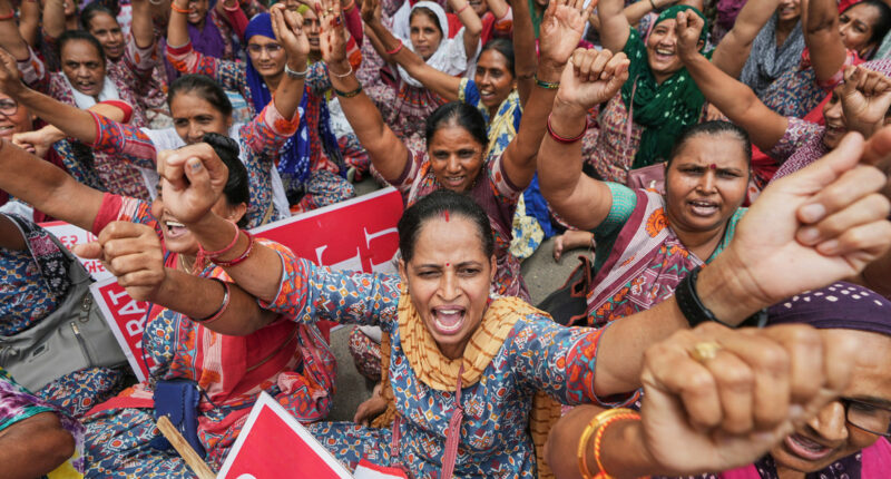 Indian workers go on a daylong nationwide strike against Modi's economic reforms