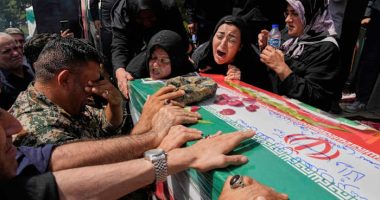 Iran's government says at least 1,060 people were killed in the war with Israel