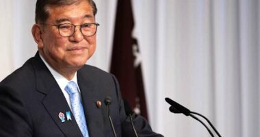 Japan's Ishiba says he'll stay in office to tackle inflation and US tariffs despite election loss