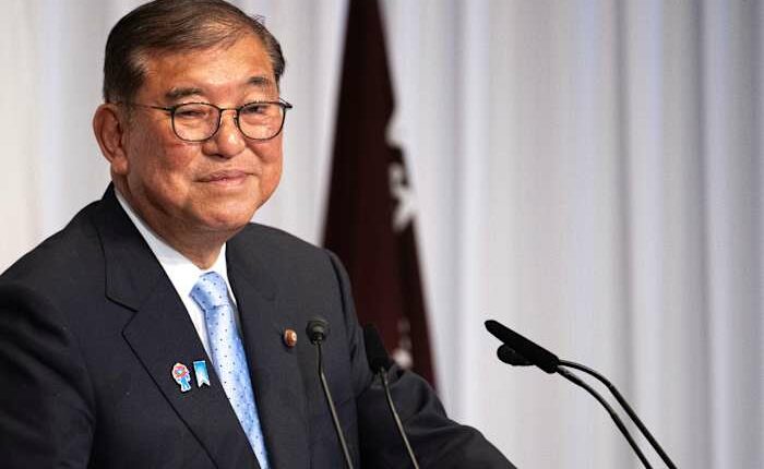 Japan's Ishiba says he'll stay in office to tackle inflation and US tariffs despite election loss