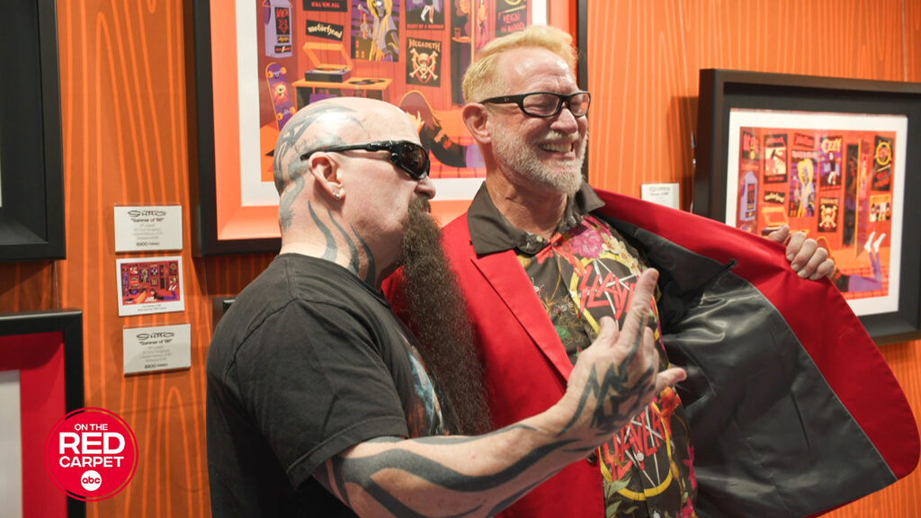 Kerry King of Slayer makes surprise appearance at "Shag" art booth to sign art and take photos with artist Josh Agle