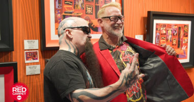 Kerry King of Slayer makes surprise appearance at "Shag" art booth to sign art and take photos with artist Josh Agle