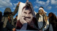 Kurdish fighters in northern Iraq to hand over weapons in first step toward disarmament