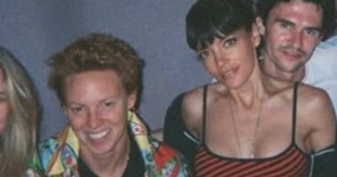 Lily Allen showcases her incredibly toned abs in a TINY bralette