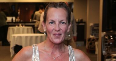 Lorraine Stanley displays five-stone weight loss in sequin tulle gown