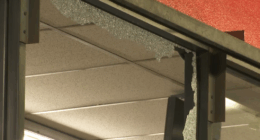 Shattered window at the L.A. AutoZone following the looting